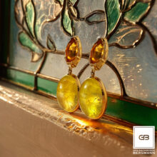 Ohrringe mit Citrinen und gelben Beryllen gefasst in 750er Gelbgold