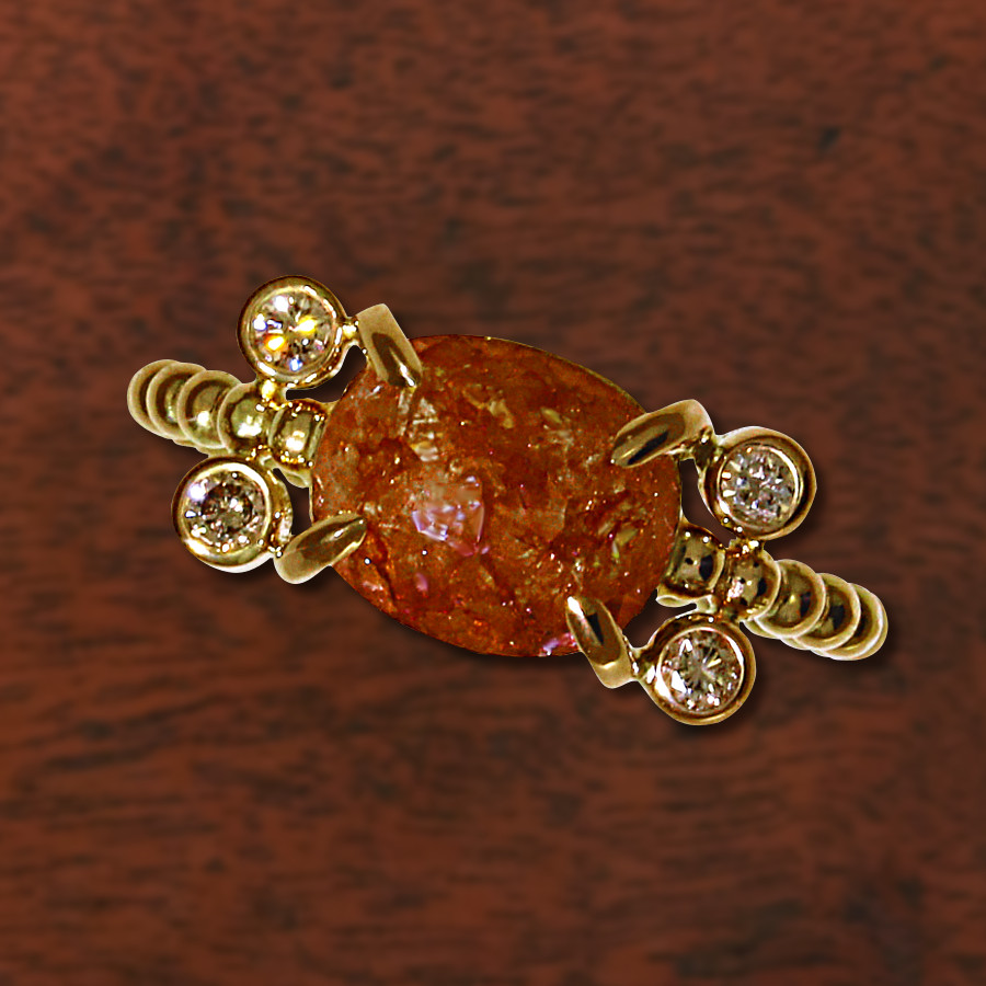 Ring mit braunem Diamanten im Rosenschliff und 4 kleinen braunen Brillanten mit Kugelschiene in Rosegold